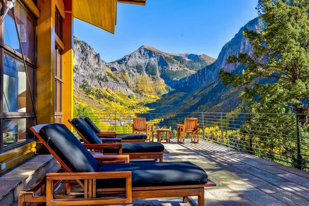 The deck of a vacation rental in the mountains.