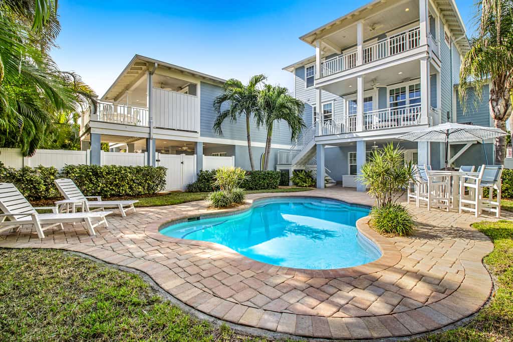 The back yard and porch of a snowbird vacation rental in Holmes Beach, Fl.