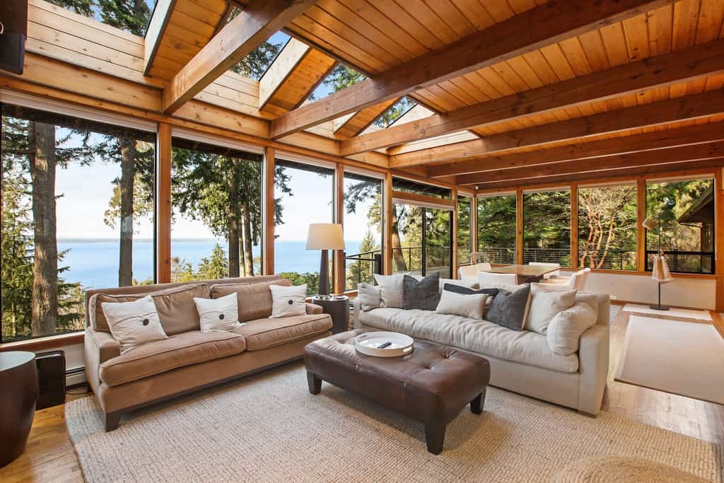 The living area of a Freeland, WA vacation rental overlooking the water.