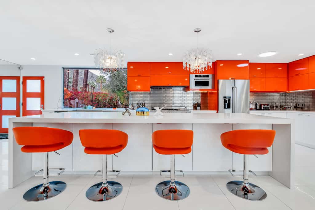 orange accented mid century modern kitchen
