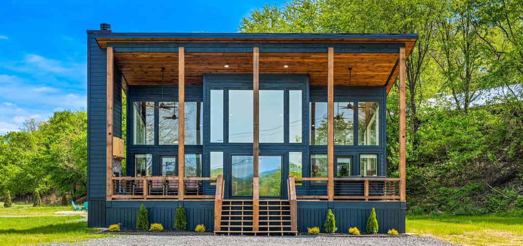 The exterior of a modern cabin rental in Blue Ridge, GA.