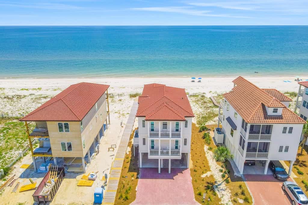 Drone shot overlooking a vacation rental and the coastline of St. George Island, Fl.