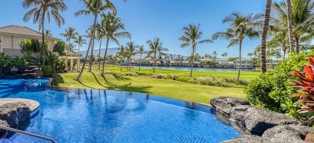 Pool overlooking the bay at a vacation rental in Hawaii