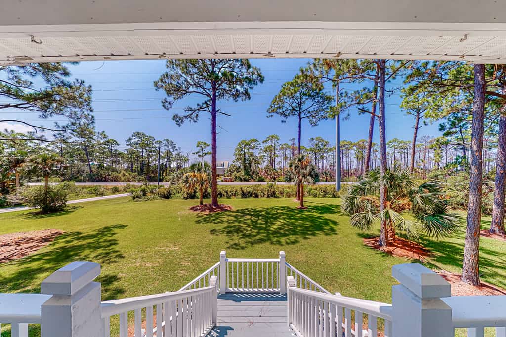 The perspective from the a back deck overlooking the vibrant property at a vacation rental in Port. St. Joe.