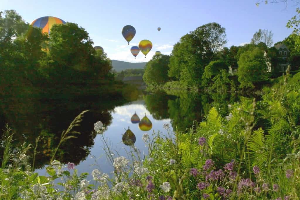 Air balloons over a lake in Quiche, VT.