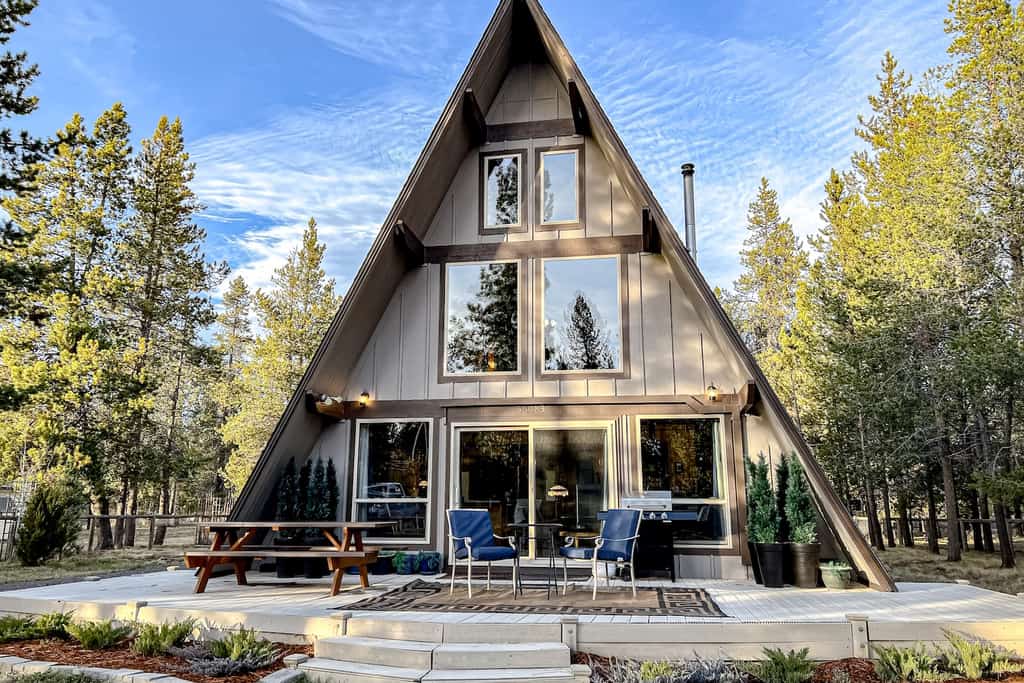 The exterior of an a-frame cabin rental in Sunriver, OR.
