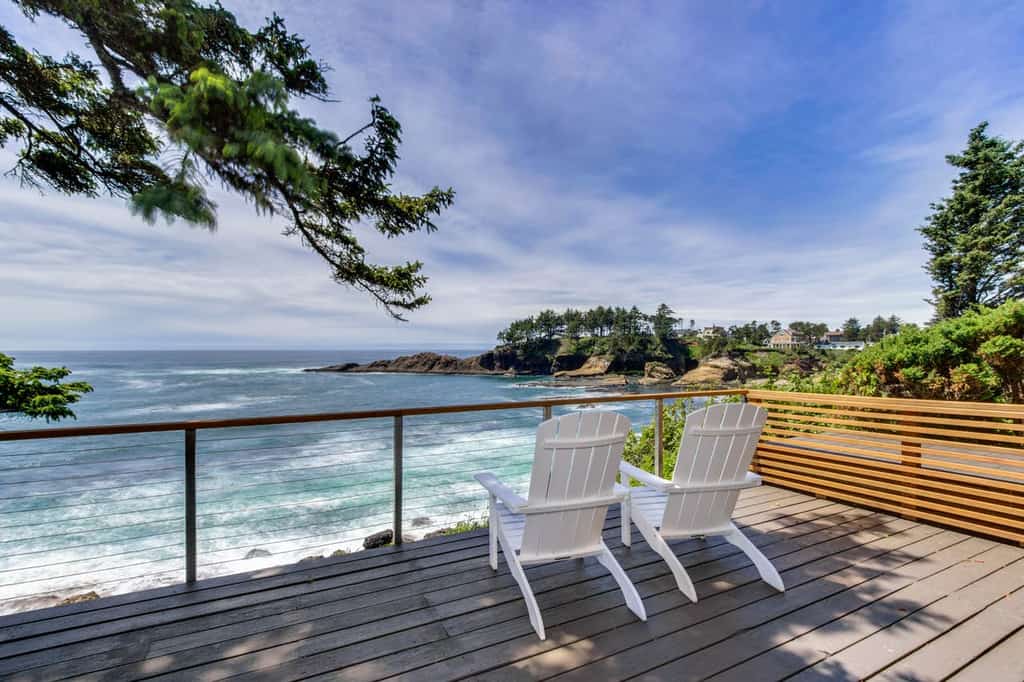 vacation rental with deck overlooking the beach