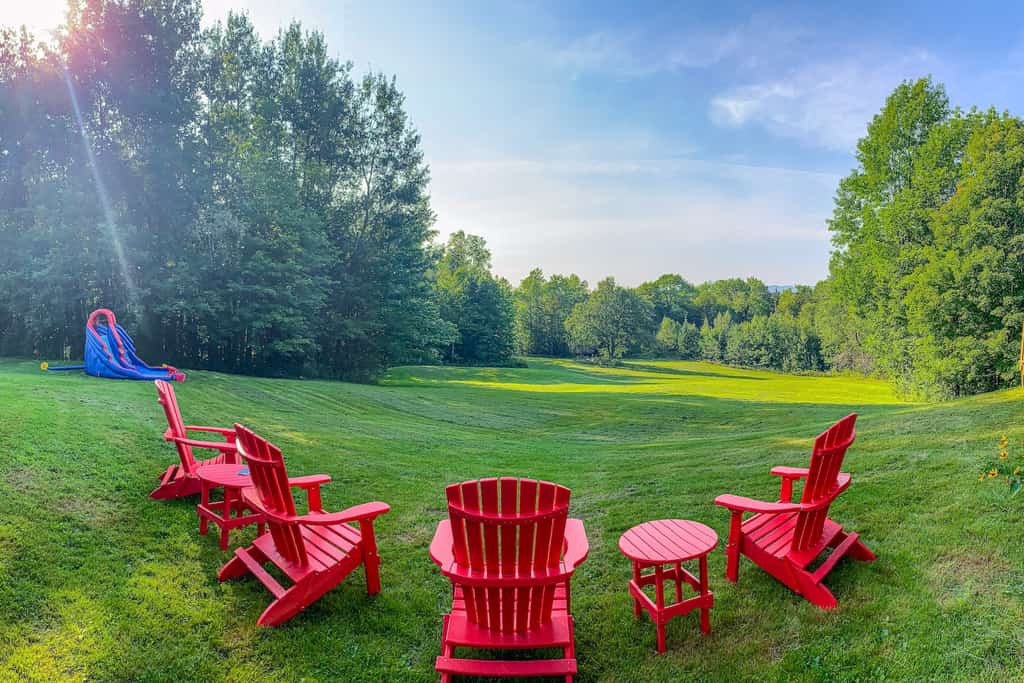 Chairs overlooking a large field in Wilmington, VT.