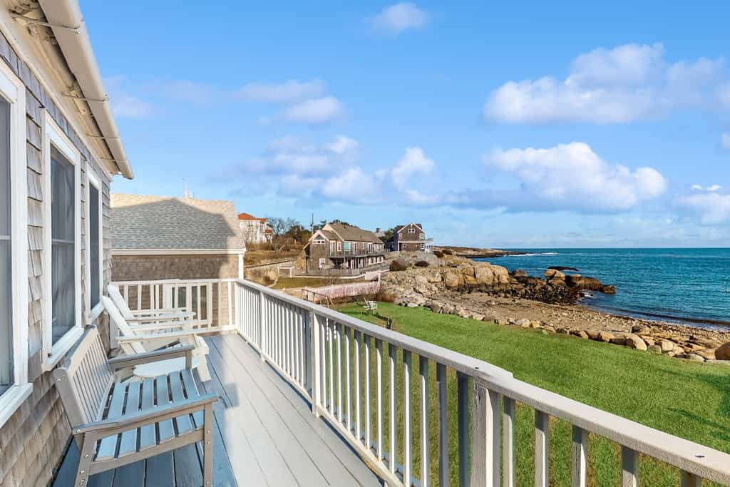 The patio overlooking the water at a Rockport, MA rental.
