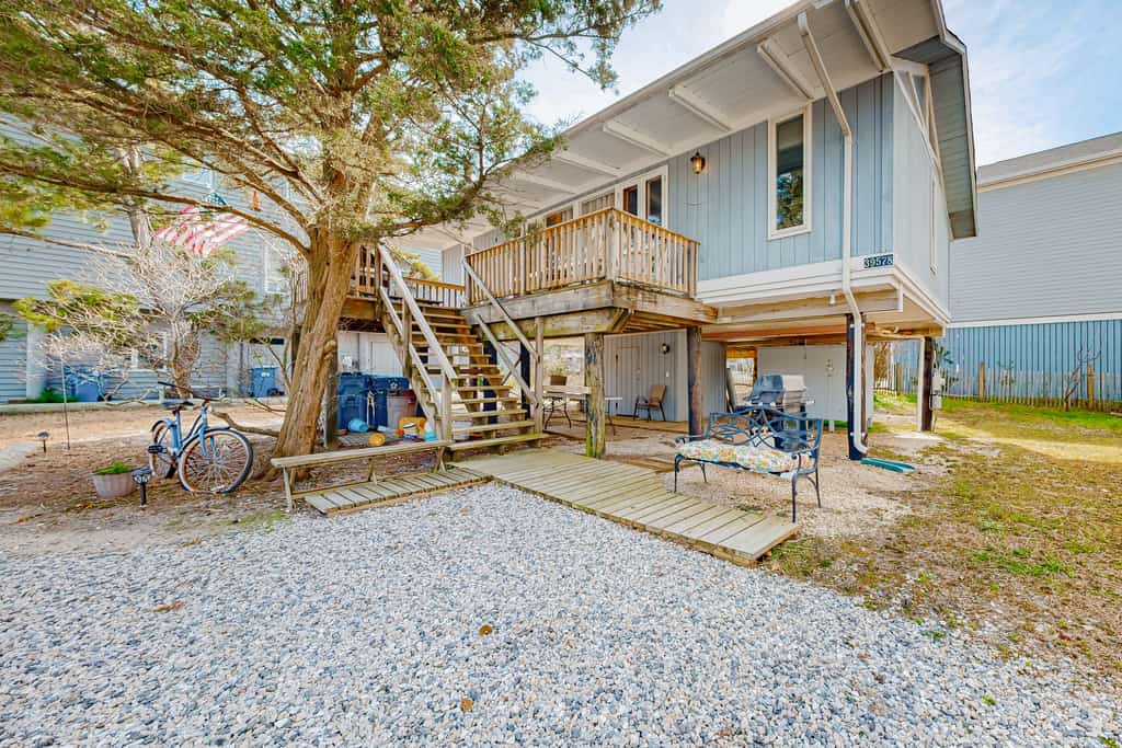 The exterior of a vacation rental with two stories in Bethany Beach, DE.