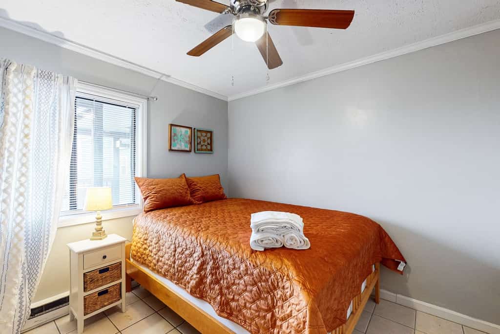 The bedroom of a vacation rental in NC.