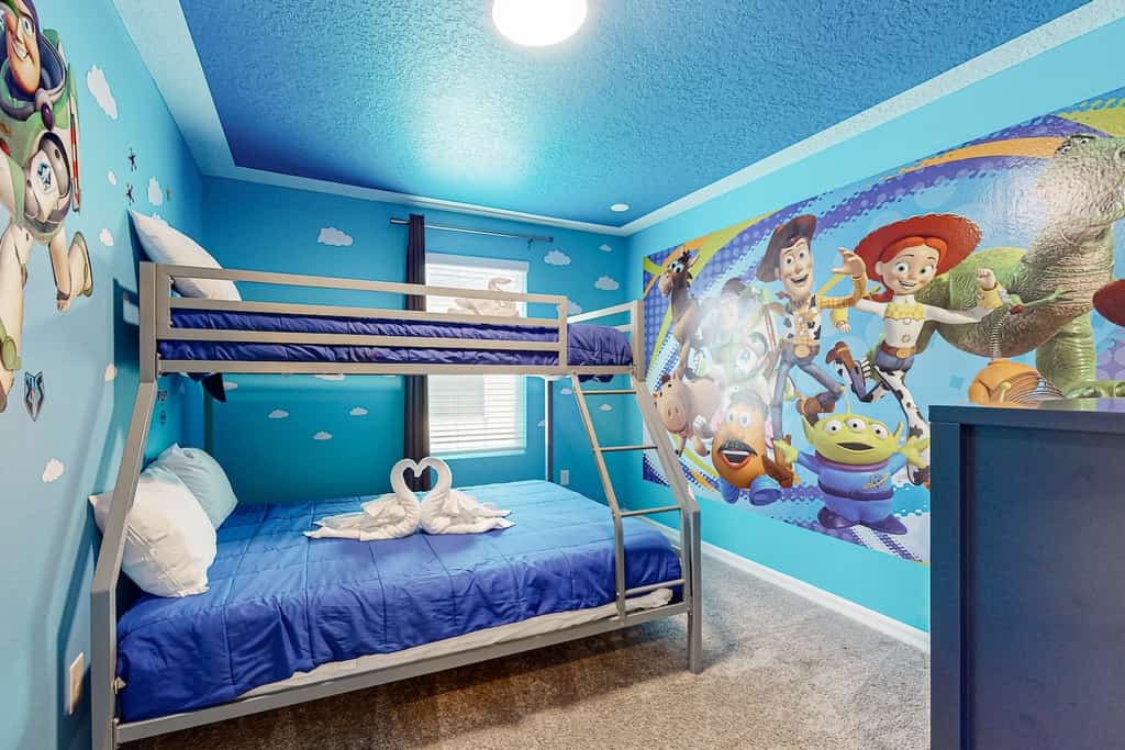 A bedroom themed like Toy Story.