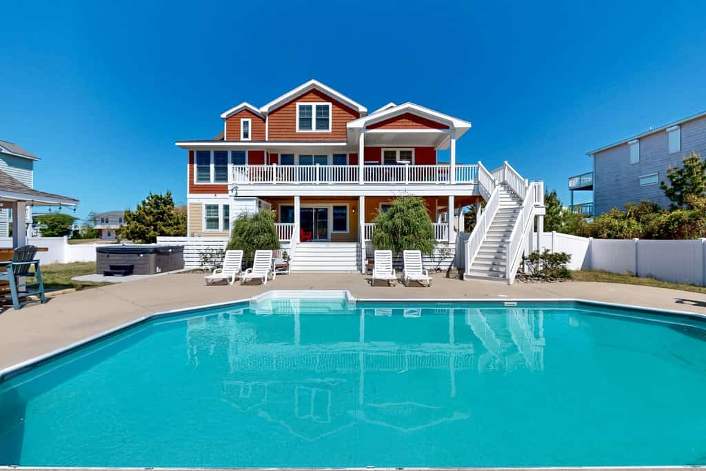 orange colored family beach home with private pool and hot tub in virginia beach