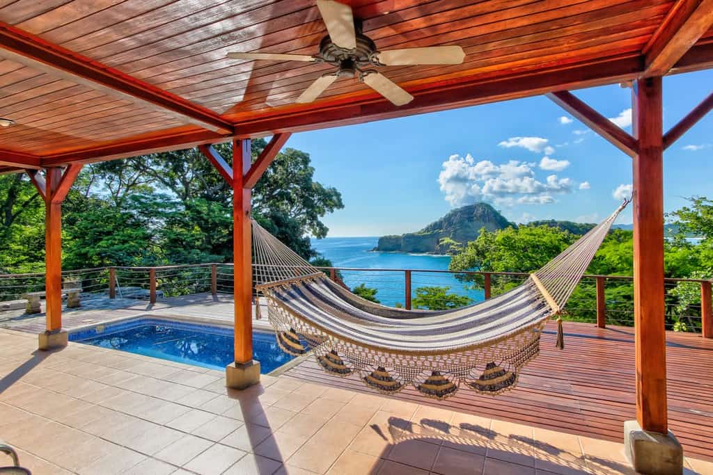 Nicaragua oceanfront vacation rental with a pool and a hammock for lounging
