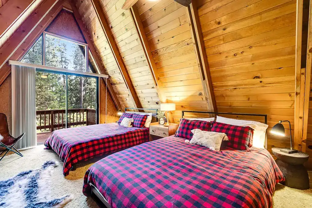 A frame cabin bedroom
