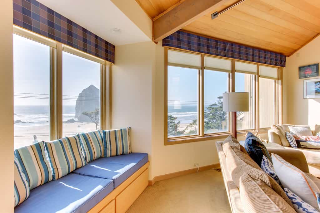 The living room view of Haystack rock at a vacation rental in Cannon Beach.