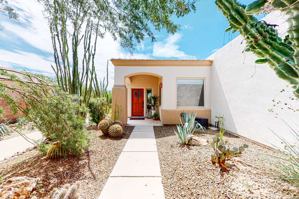 The entrance of a vacation rental designed in adobe in Arizona.