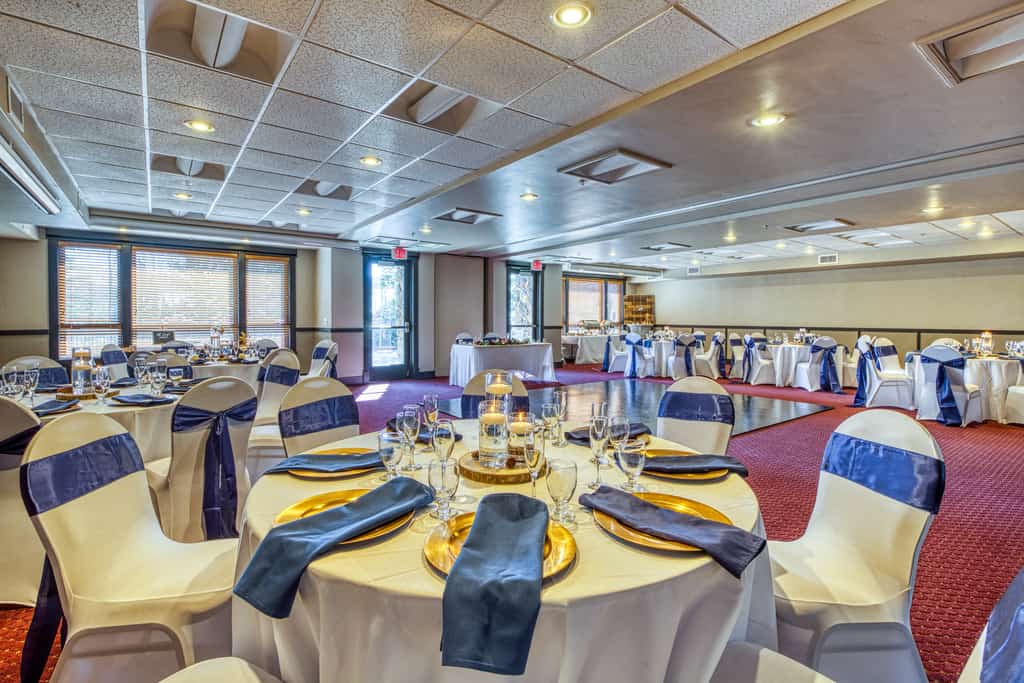 BlueSky Breckenridge ballroom with arranged tables and dance floor.