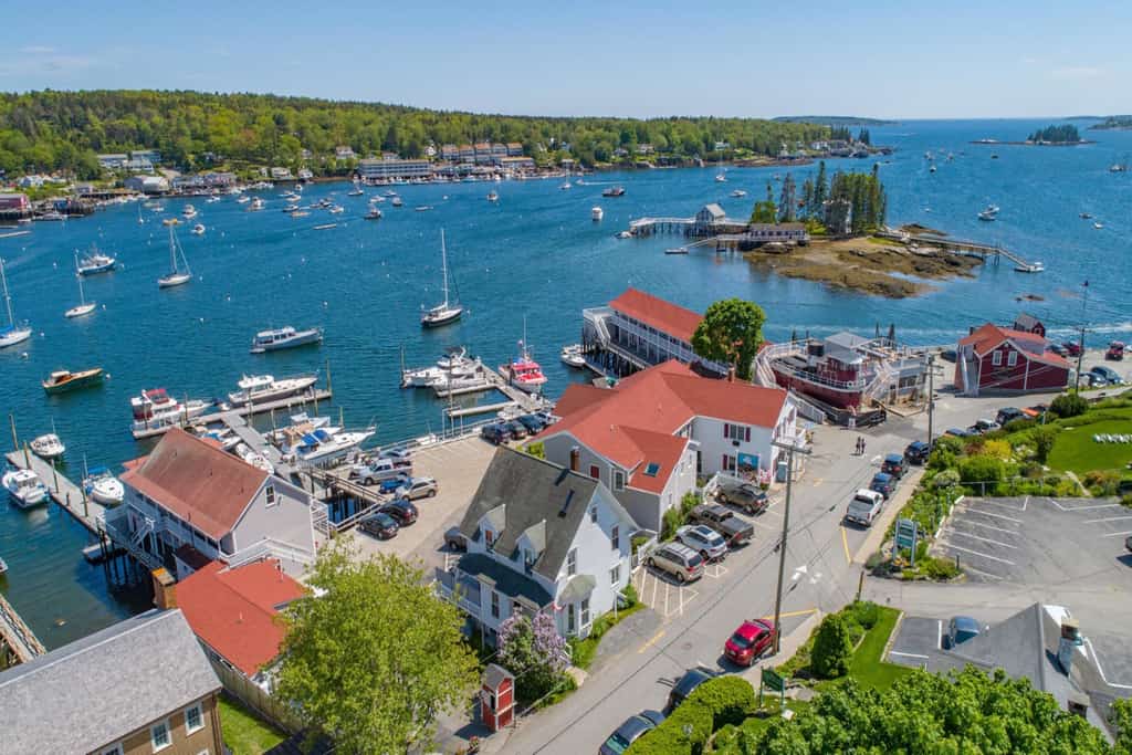 Aerial view of Boothbay, ME at a harbor with boats on the water
