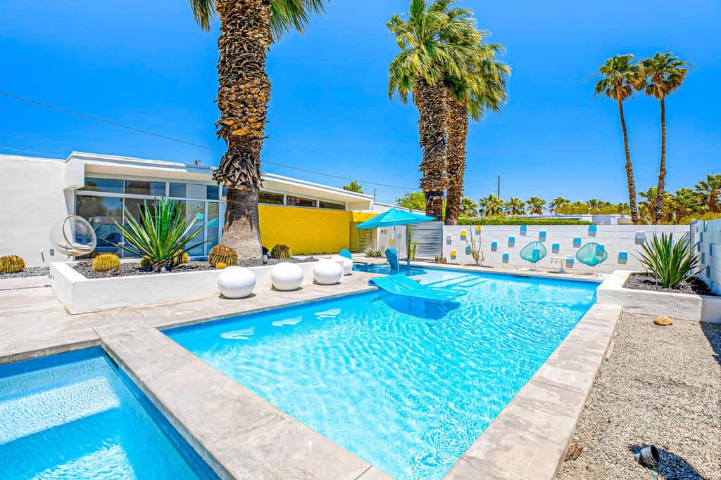 The back yard of a Palm Springs vacation rental with a pool