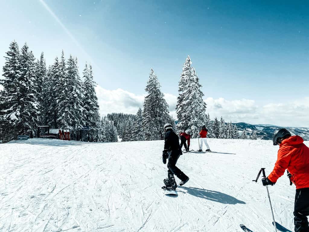 Skiers and snowboarders.
