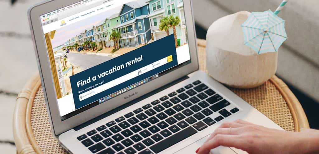 women booking a vacation rental with Vacasa on her laptop