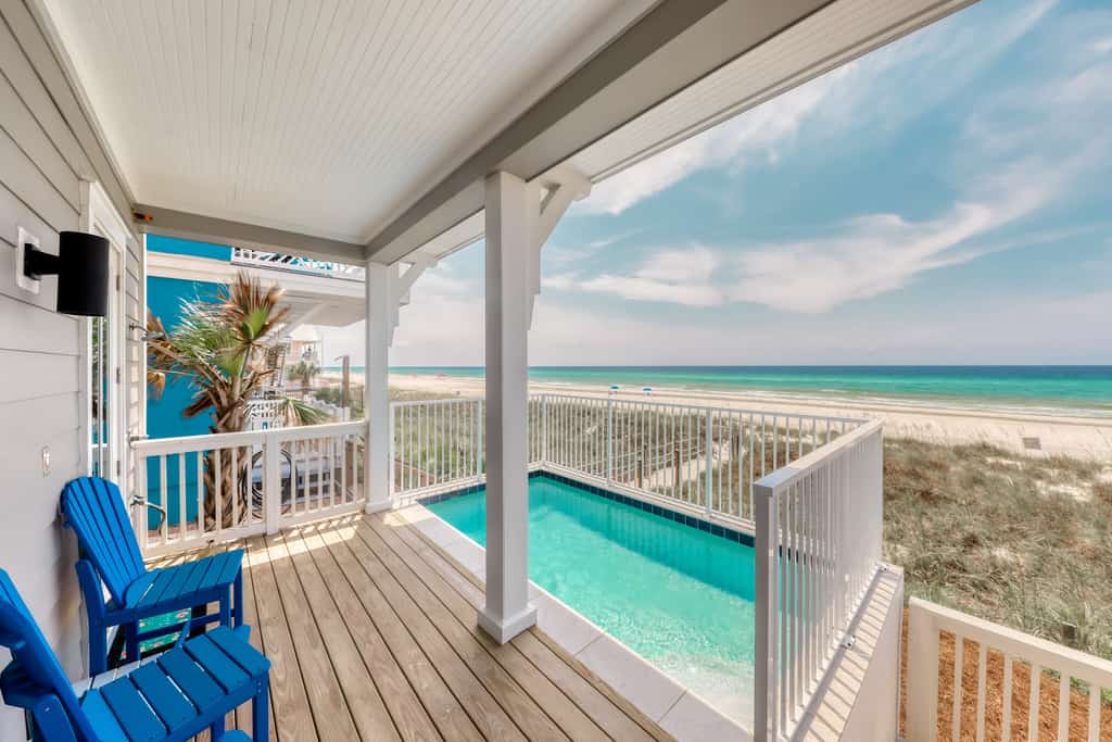 The view from a balcony overlooking the coastline at a vacation rental condo in Panama City Beach.