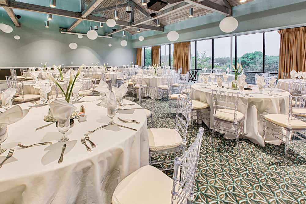 Centre Court Meeting Room large round tables set up for reception dinner