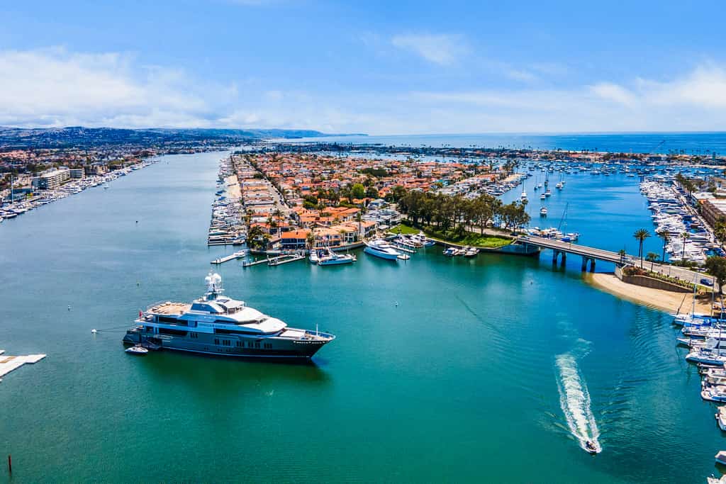 Aerial view of a yacht in the harbor at Newport Beach CA.