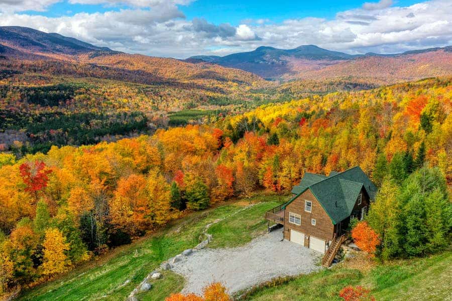 beautiful fall colors surround a home in Newry, Maine