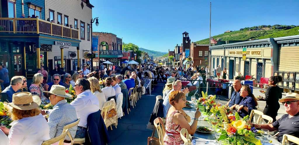 People dining outdoors at Savor the Summit in Park City.