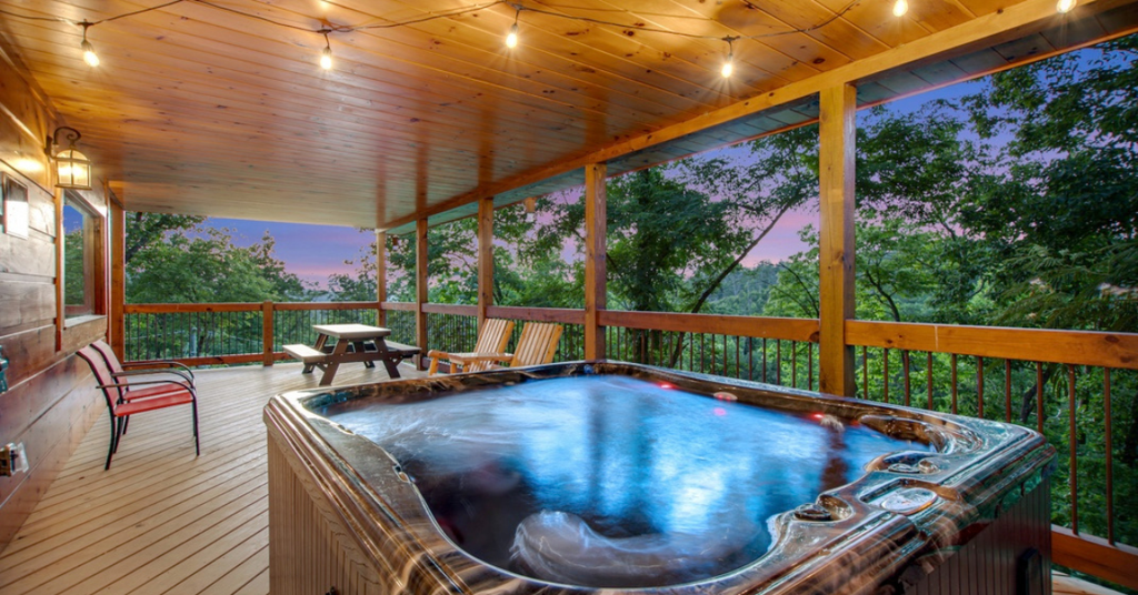 Bubbling hot tub on a Smoky Mountain deck at sunset