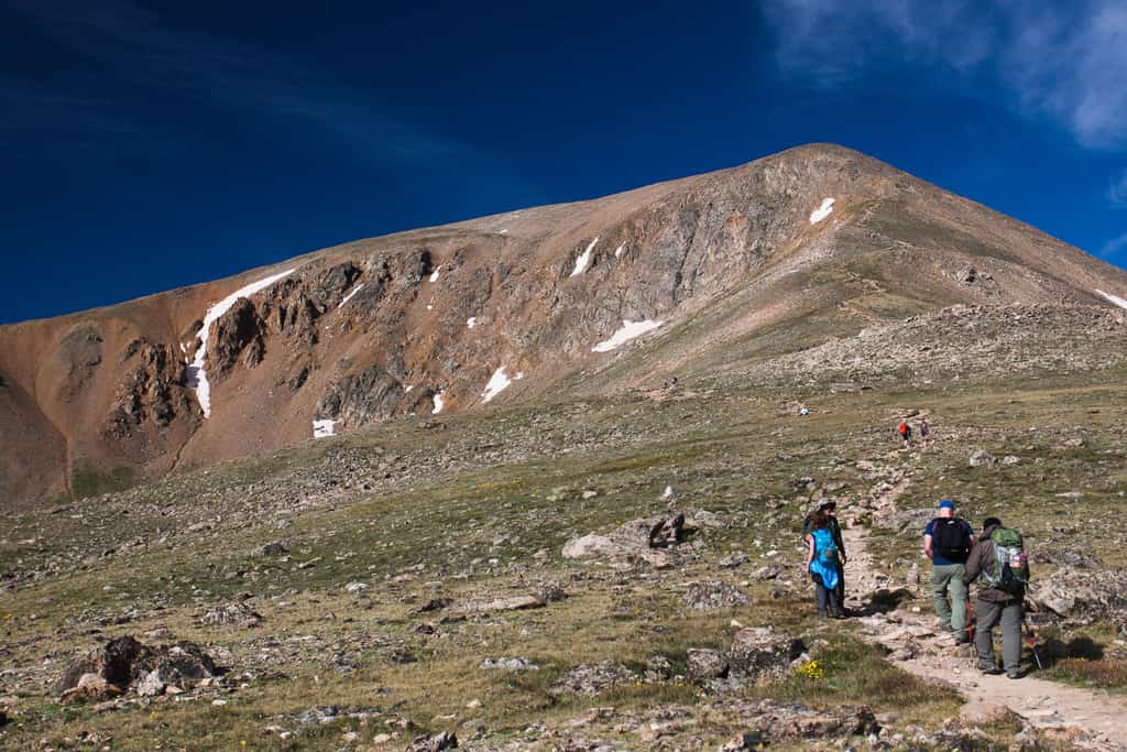 hikers going up to the peak of Mount Elbert