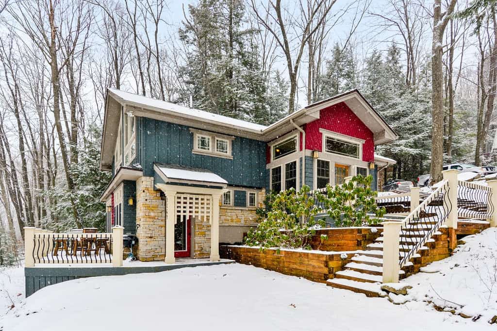 snow falling outside of a luxury vacation home in deep creek lake
