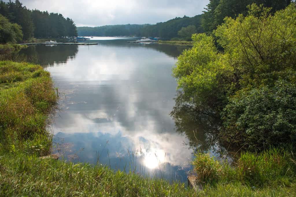 the sun reflecting off of the water on Deep Creek Lake
