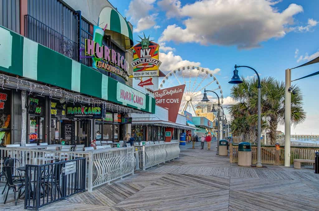 What to do in Myrtle Beach: boardwalk with storefronts in myrtle beach