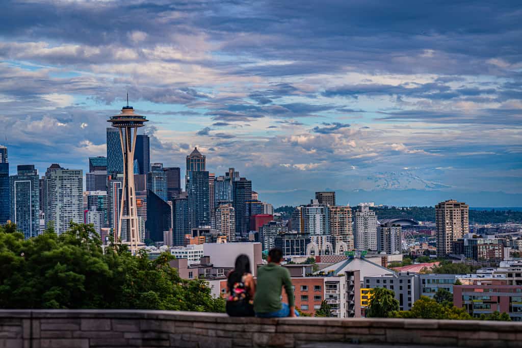 couple enjoys the seattle city-scape at night
