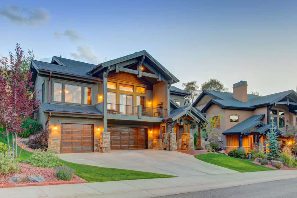 vacation home in park city with three car garage and landscaped lawn