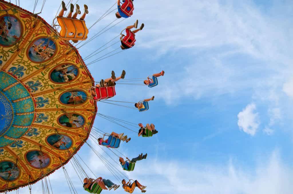 People on an amusement park ride.