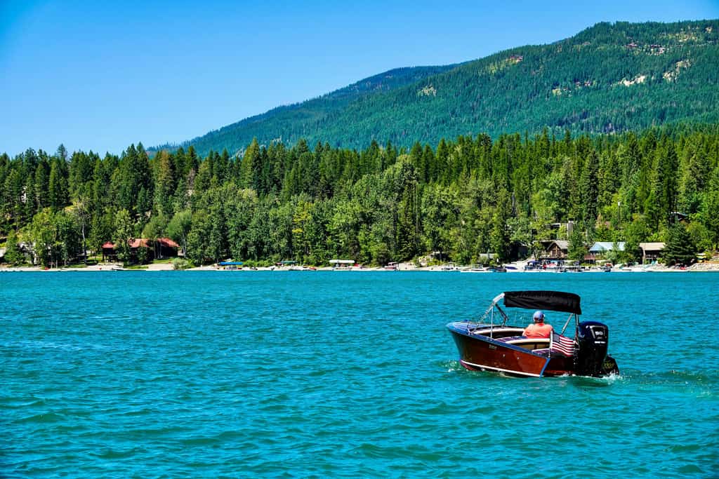 Man on a boat on a Whitefish, MT lake.