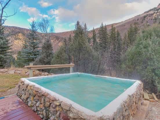 riverfront vacation rental in colorado with outdoor hot tub