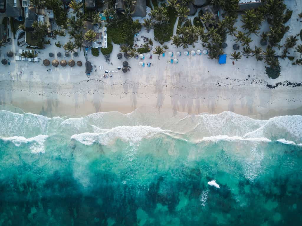 A beach communicating the differences of Hawaii vs Mexico.