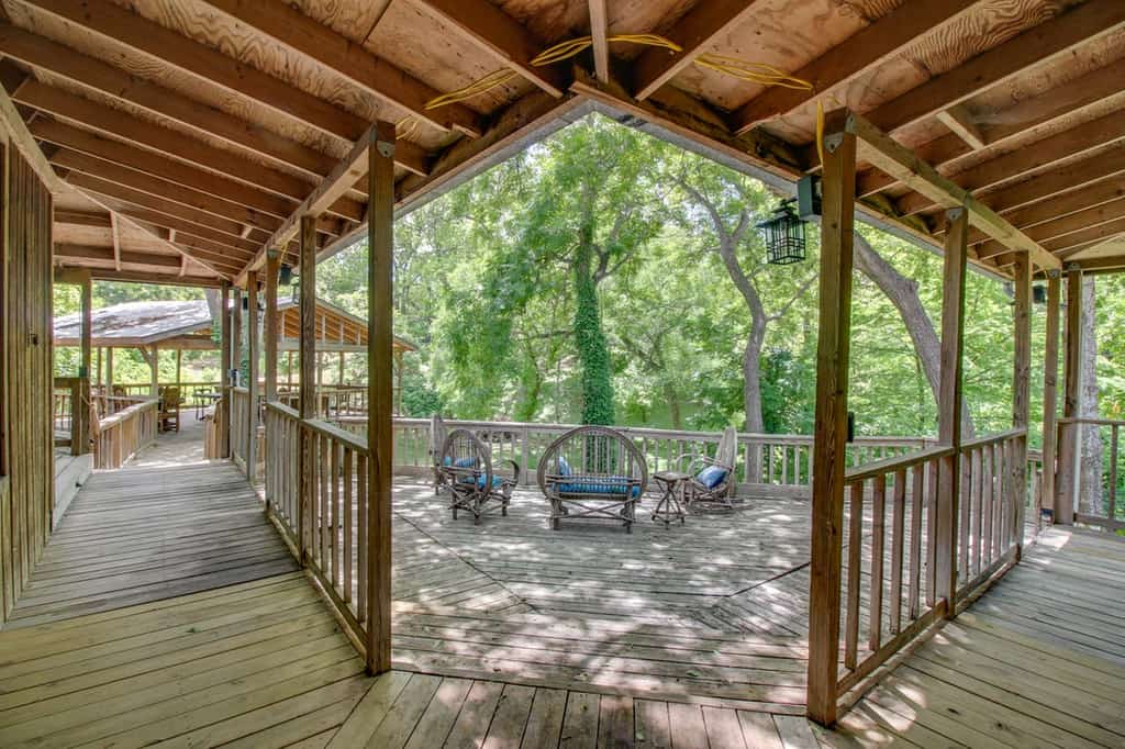 Spacious back porch with creek views