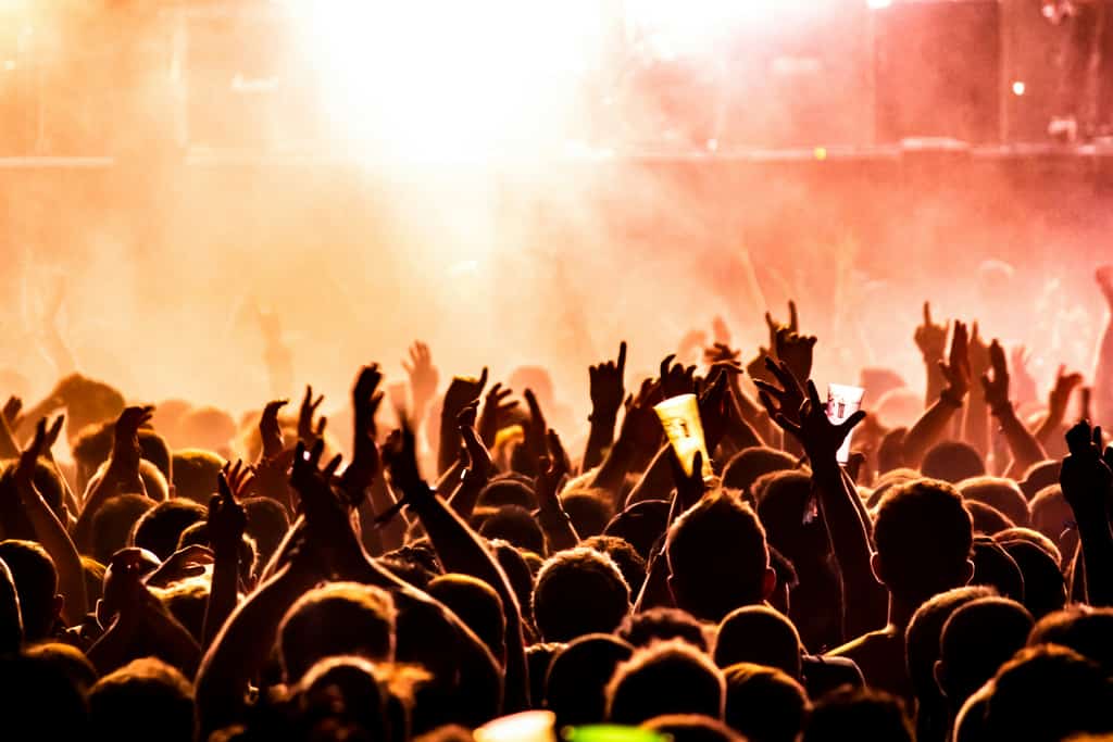 People having fun at a music festival.